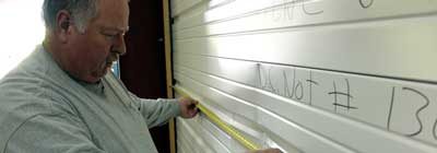 man measuring impact after fenestration testing